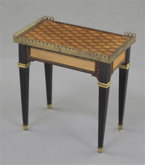 Denis Hillman. A Louis XVI style parquetry inlaid miniature table a ecrire, constructed of ten different woods, width 2.25in.